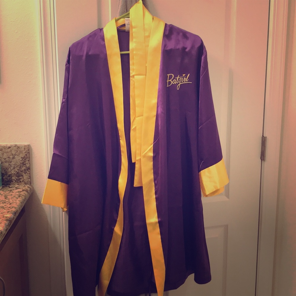 Batgirl Purple & yellow. Knee length. Smoke-free.